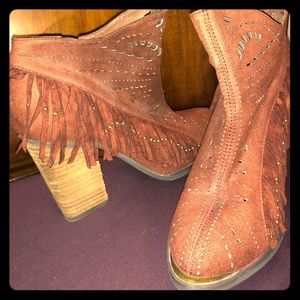 Red/brown tassel heeled boots.